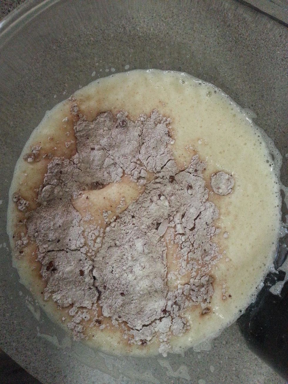 Beat until sugar dissolves. Fold in sifted flour and cocoa. Next add melted butter and combine well.