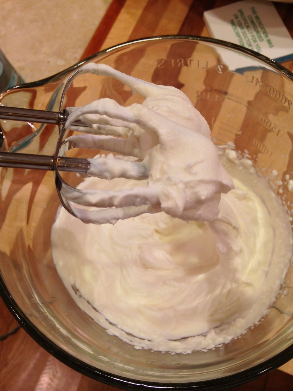 Beat until the cream forms stiff peaks, and is at its thickest