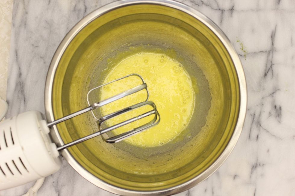 Beat with a hand mixer. Note the colour. You can whip this with a hand whisk but your arm might fall off...