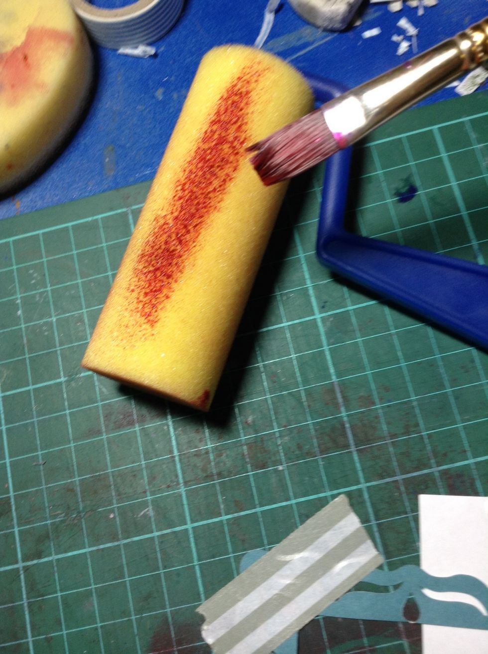 Because I am using watercolour, I have only put a little bit of paint onto the roller. If I was using acrylic (my preferred but unavailable paint) I would use more readily.