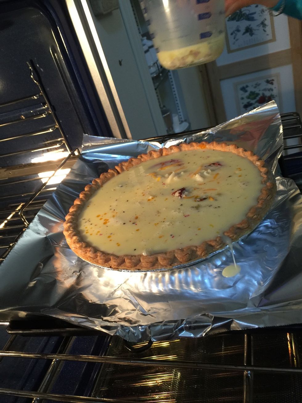 Because it gets VERY full and would be impossible to move afterward!\ud83d\ude33. Notice the aluminum foil under the pan.....burned egg on the bottom of the oven is NOT good!\ud83d\ude2c