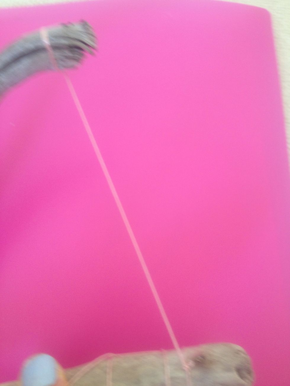 Because it wasn't round it was to hard to pull tight so I wasn't able to make it properly. To solve this I put a piece of string across the end.