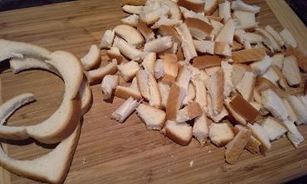 Because we hate to waste food, take the bread crust and cut into cubes.
