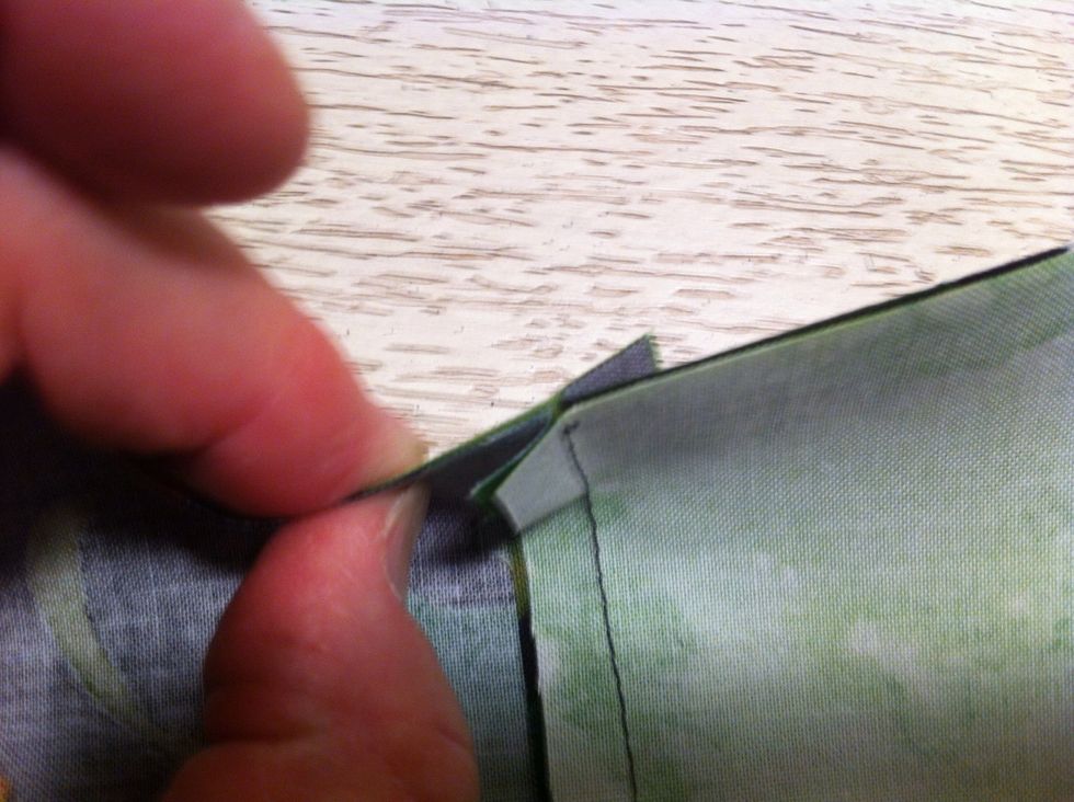 Because you pressed the seam allowances to the 'dark side' now the seam allowances are pointed in opposite directions. Slide the seam lines together with allowances pointed in opposite directions.
