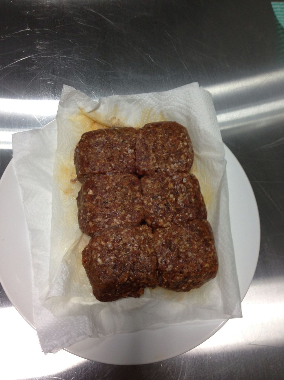 Beef - mix with bred , salt and black pepper ! I make it like a meet ball ... Lol