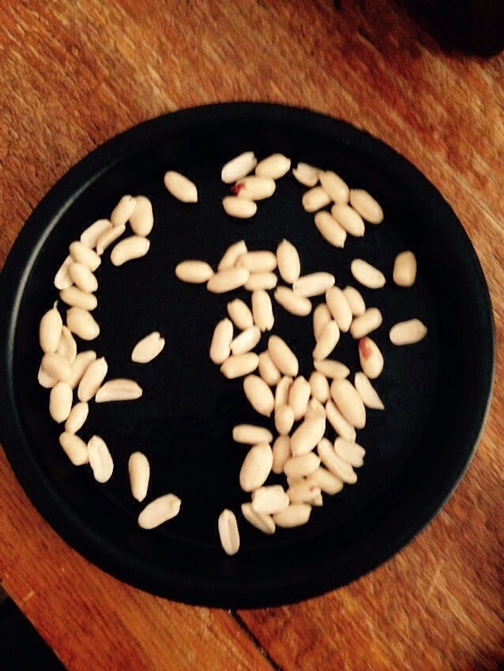 Before actually cooking the pad thai, you will need to prep all the ingredients. Start from the peanuts, place them in a baking tray with some veg oil and roast them in the oven grill.