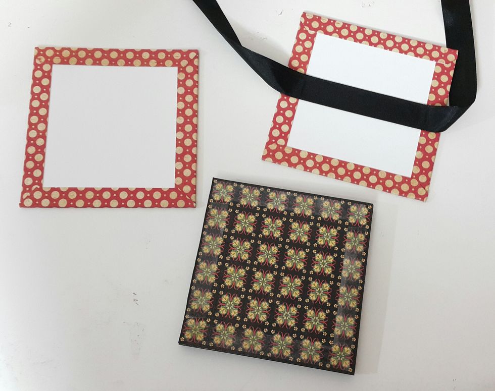 Before adhere the pages onto the cover, remember to put ribbon in between.