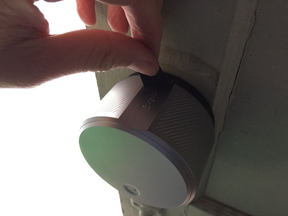 Before calibrating, make sure to remove the tape on the top of the lock.