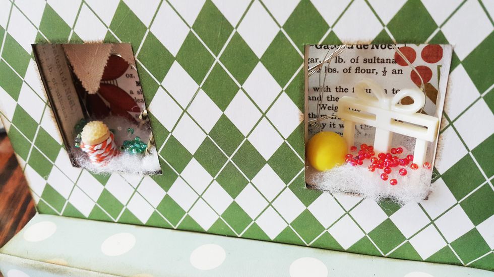 Before cover the window with acetate, decorate the shop windows with embellishments.
