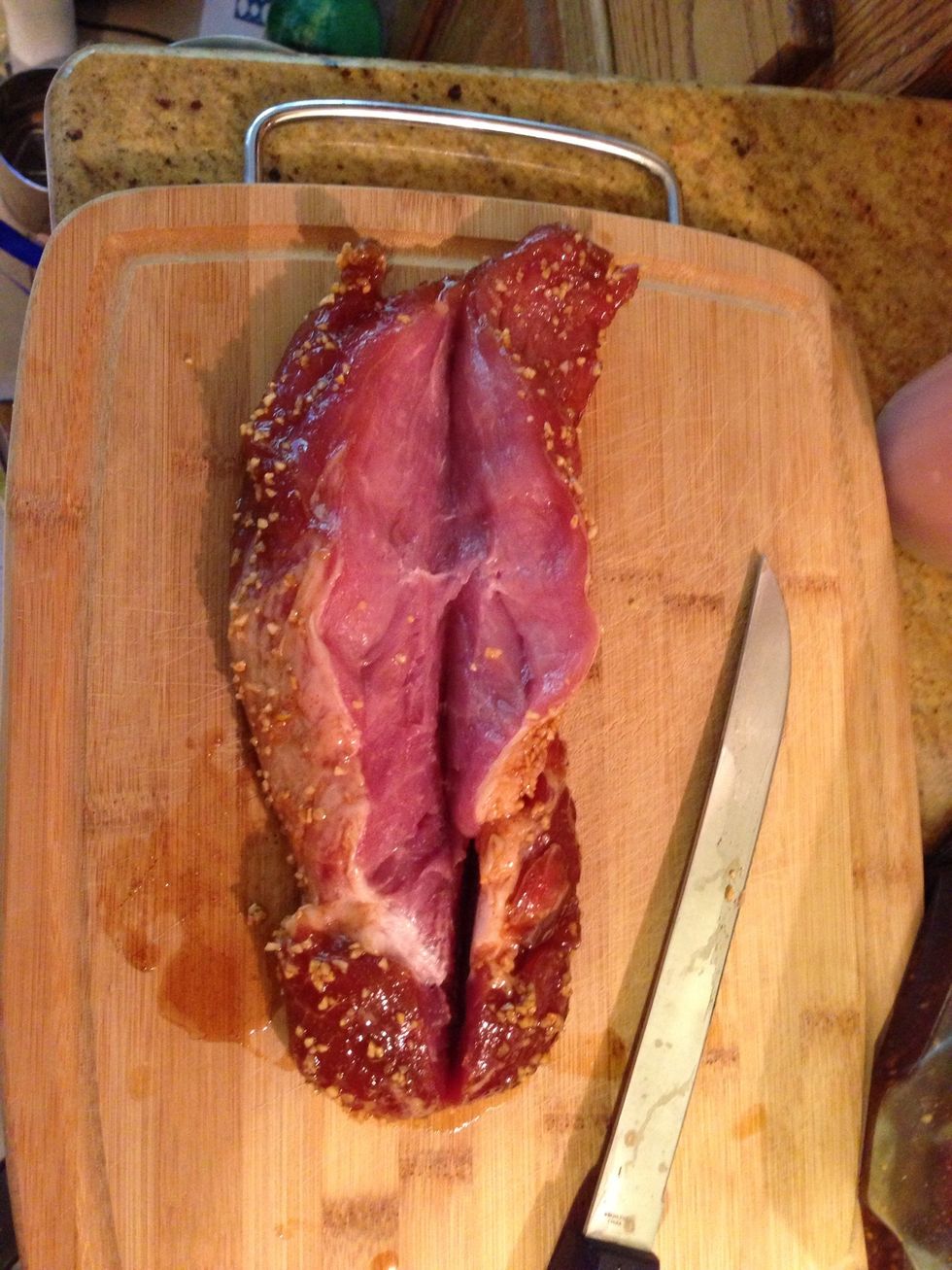 Before grilling cut tenderloin in half lengthwise but not all the way through. Oh & reserve marinade for basting.