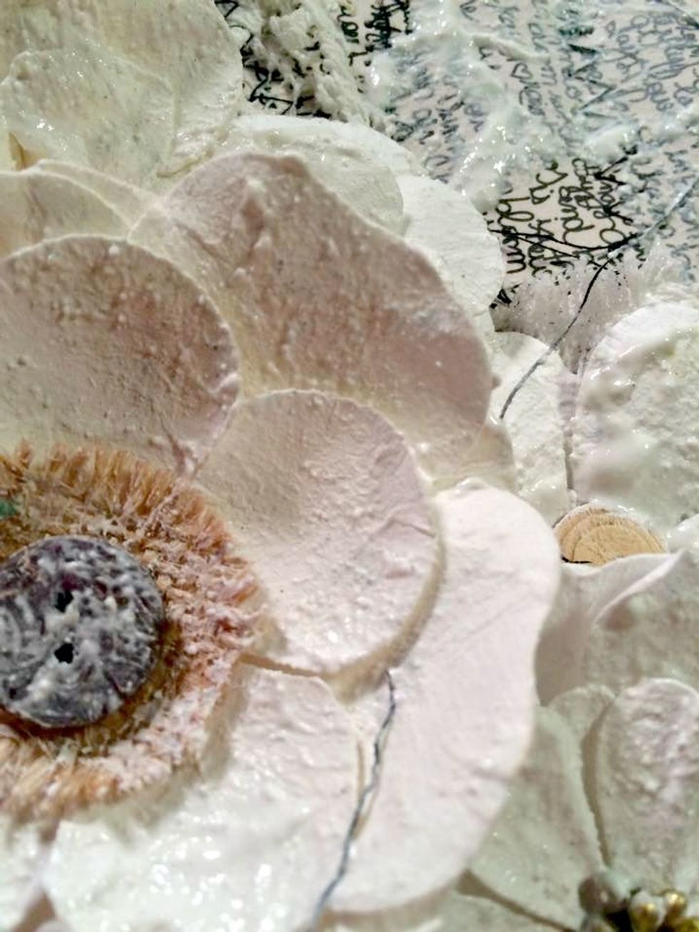 Before I added the Stucco I had hot glued down my flowers and the gathered fabric. I added the Stucco to the flower petals and also the gathered fabric. The mist will take differently to each surface