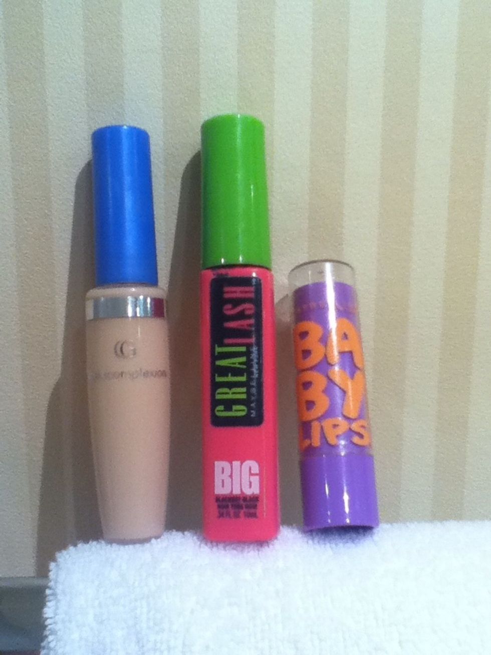 Before I start, I'm wearing very little makeup. This is Covergirl's FreshComplexion concealer in Creamy Natural. Also, Maybeline's GreatLash Mascara in Blackest Black, and Baby Lips in Peach Kiss.