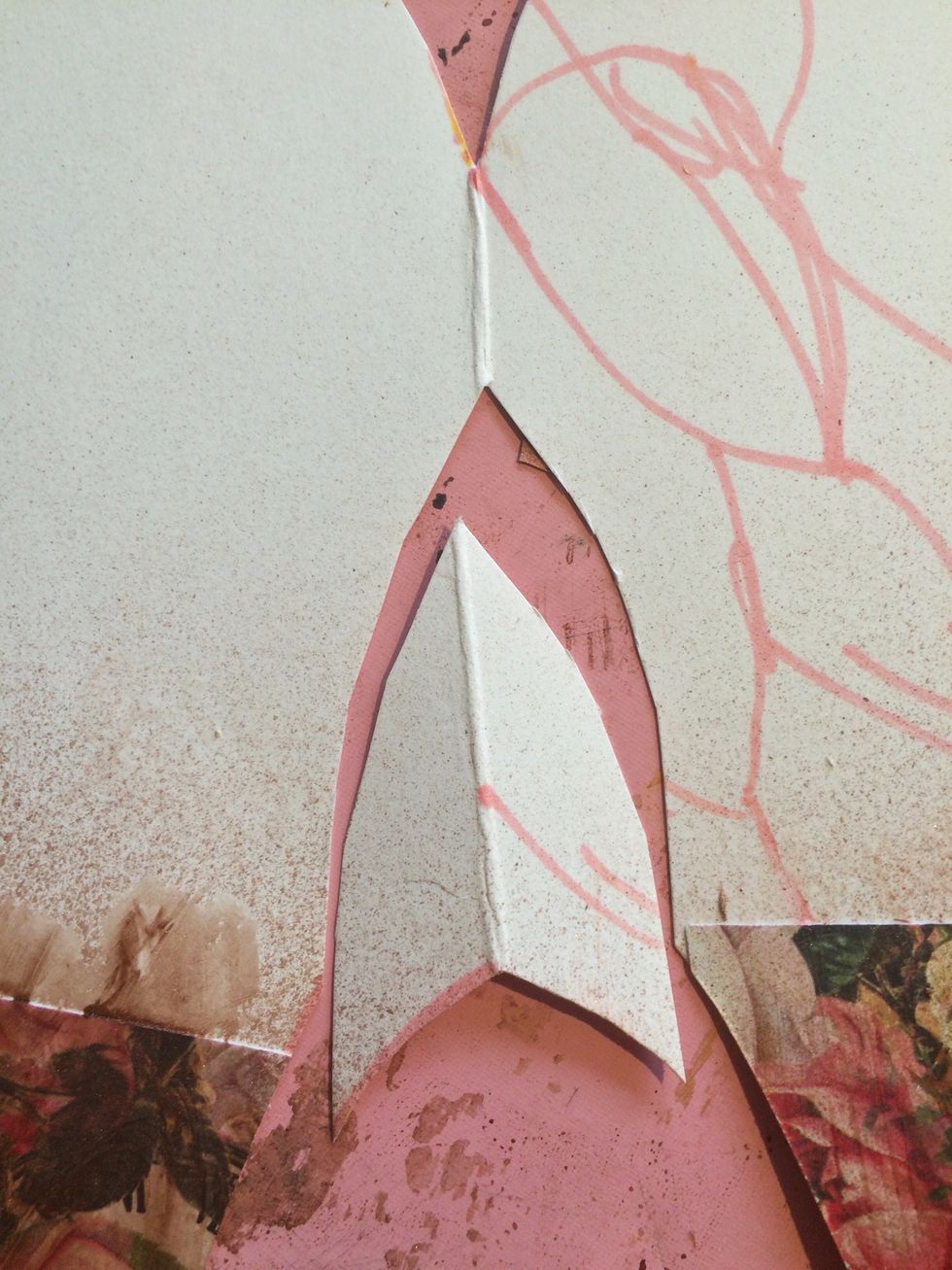 Before I started adding my feathers, I decided to trim down the connector between my two wings. I also did a couple of dry runs with my feathers to get an idea of how best to arrange them.