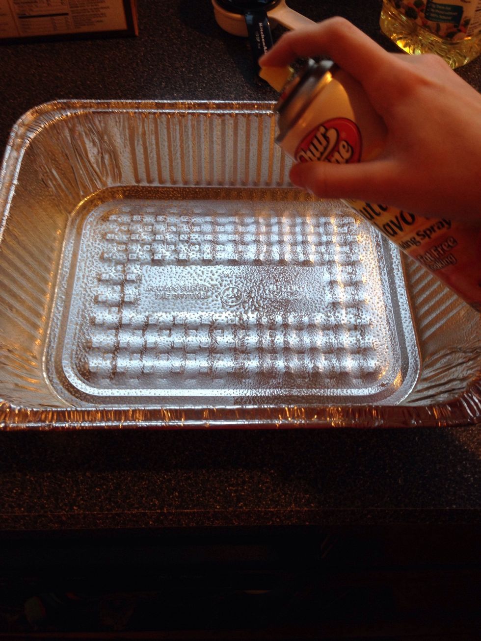 Before pouring brownie mix in pan, spray pan with cooking spray.