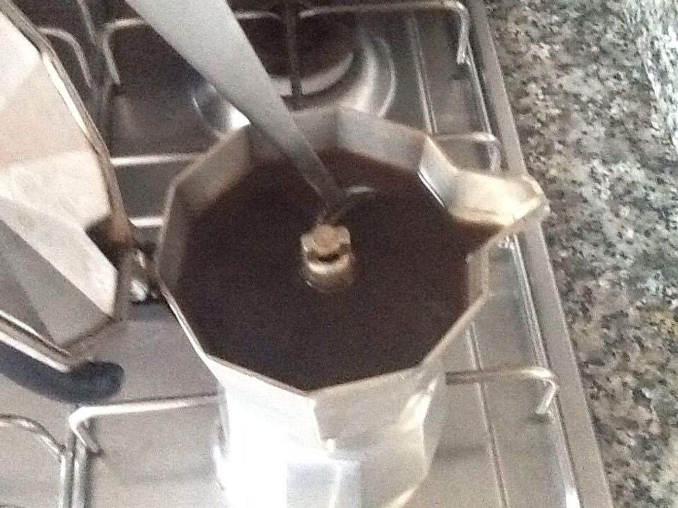 Before pouring coffee to espresso cups, take a teaspoon and stir a little bit (to equalize the different coffee layers).