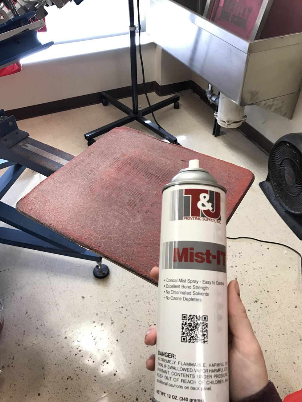 Before putting the shirt on, use mist-it to spray the palette so the shirts stick and do not move around.