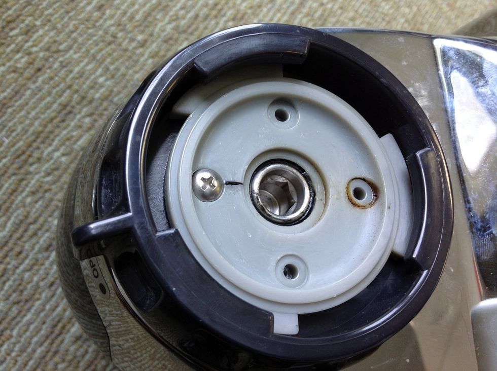 BEFORE REMOVING THE TOP SCREW, PLEASE USE A MARKER AND PLACEA LINE UNDER THE SCREW. THIS WILL HELP TO MAKE SURE THE LOCKING RING LINES UP WITH THE AUGER AFTER REPAIR.