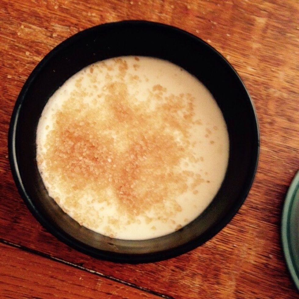 Before serving sprinkle 2 teaspoons of brown sugar and a pinch of cinnamon on top and then br\u00fbl\u00e9e with a torch