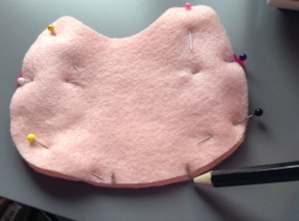 Before starting to sew, use your pencil to mark about an inch and a half where you are not going to sew.  You will need this opening to turn it inside out later.