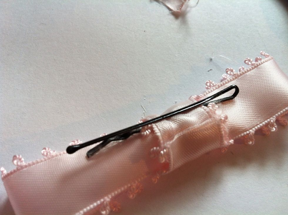 Before the glue drys, quickly insert the clip in the middle. You have to be quick in this step, it will be hard to insert it after the glue drys..