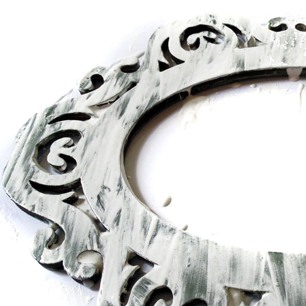 BEFORE the glue layer dries, slap on your top coat of paint. Again, cheap acrylic craft paint. IMPORTANT: The direction the paint is applied determines the direction of the cracks.