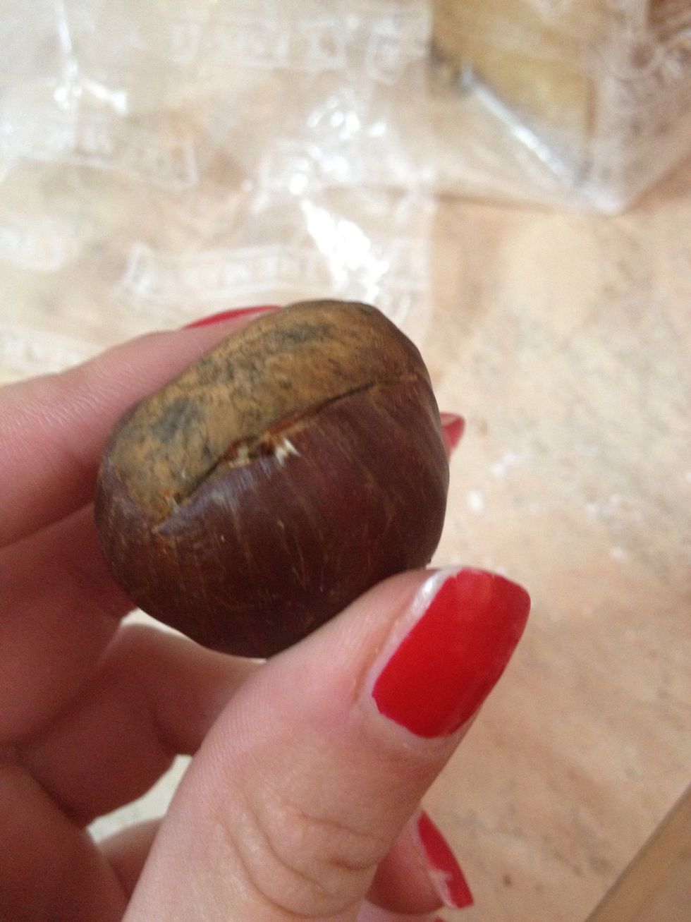 Before toasting make a cut on the chestnut just as shown in the photo!! I used a knife, but watch out to not hurt yourself, they are very tough!!!