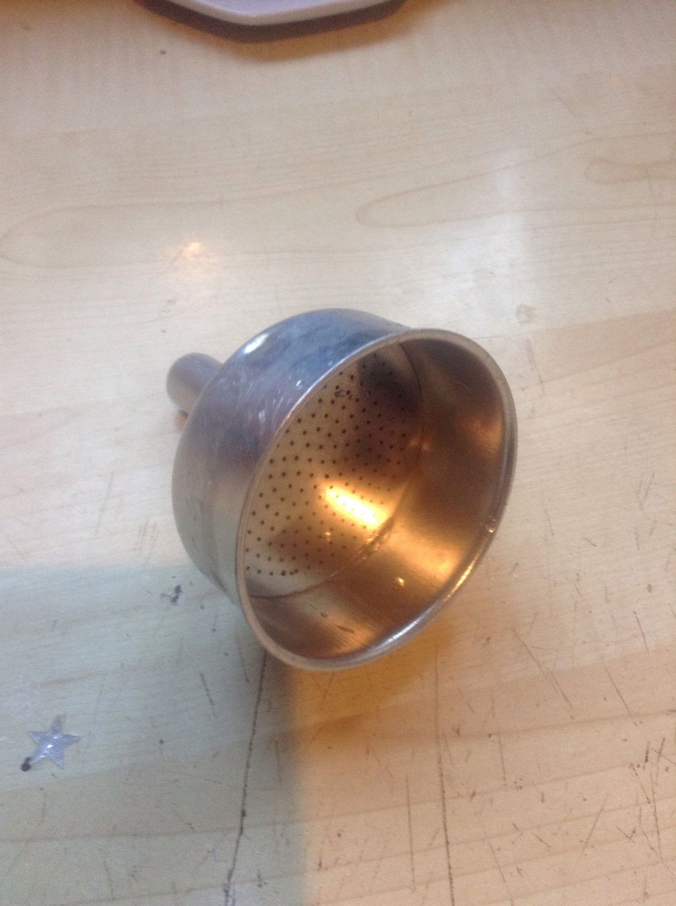 Before using the filter and continuing to the next step make sure the filter is clean,and if it isn't,your coffee wont be very nice.
