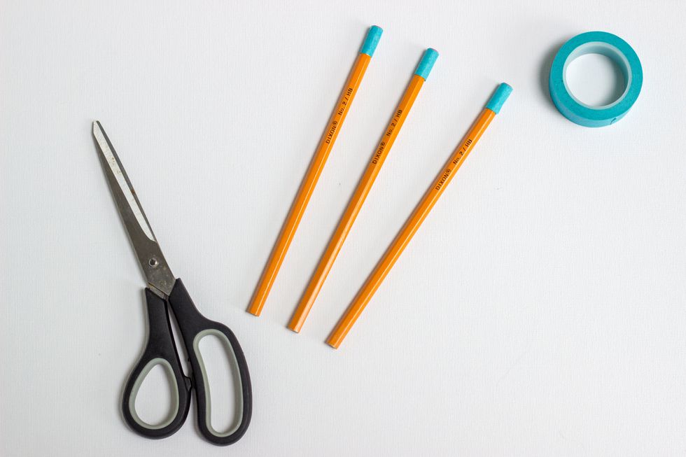 Before we start spray painting, grab your HB 2 pencils and mask off the eraser so we don't get any spray paint on it.