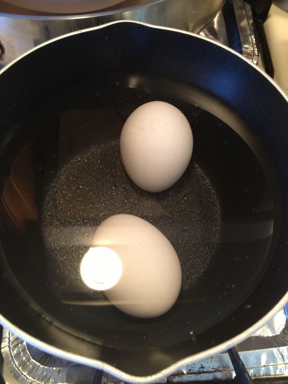 Before we start we will boil 2 of the eggs. When they are done, peel them and set aside. If you don't want eggs inside the meatloaf skip this step\u263a\ufe0f