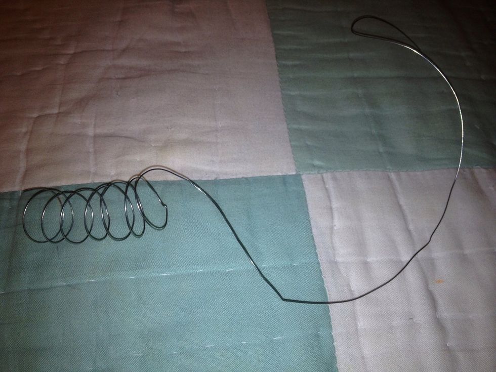 Before you cut, Leave an extra amount of wire behind to wrap around the stone. Depends on how big your stone is, but just to be safe, leave about a foot of extra wire