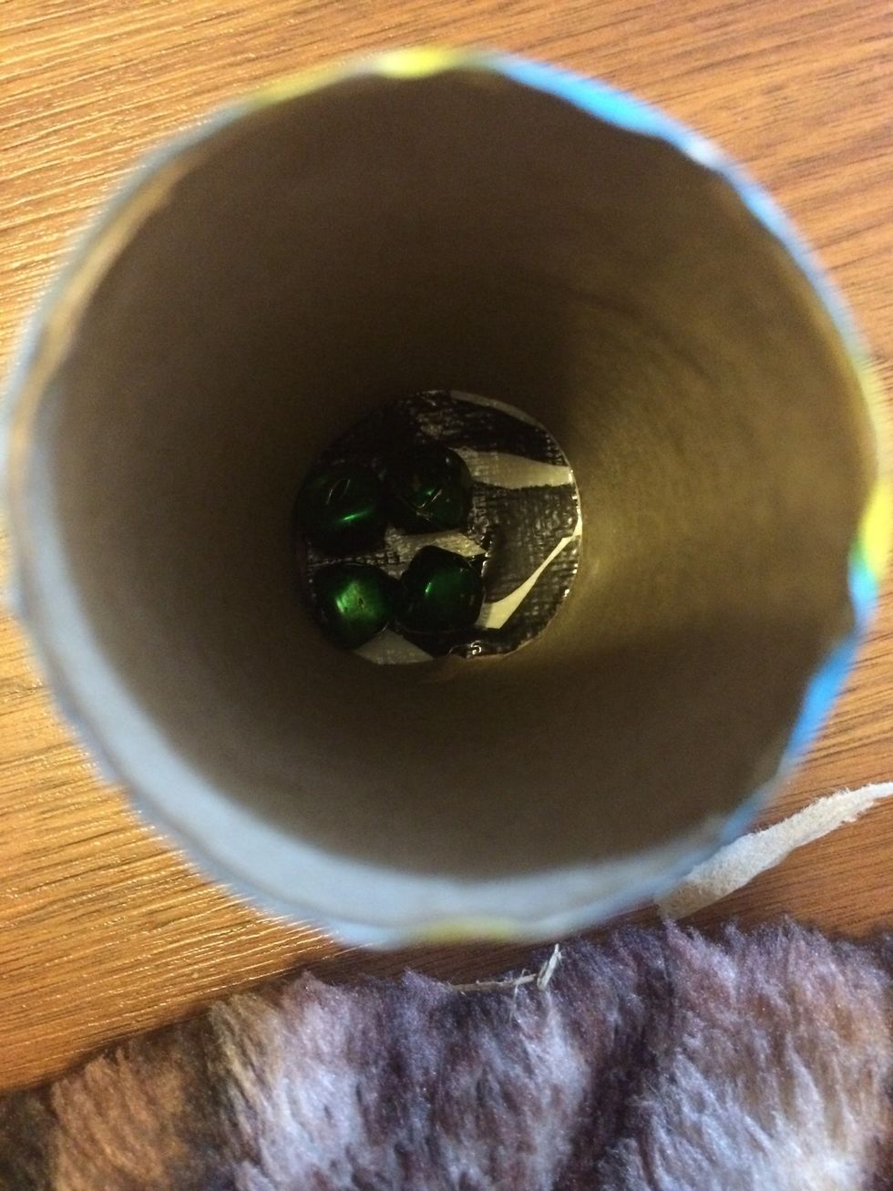 Before you put that other piece on the other side put some jingle bells in there if you have a cat. If you have a dog, you don't have to put any jingle bells in it. :)