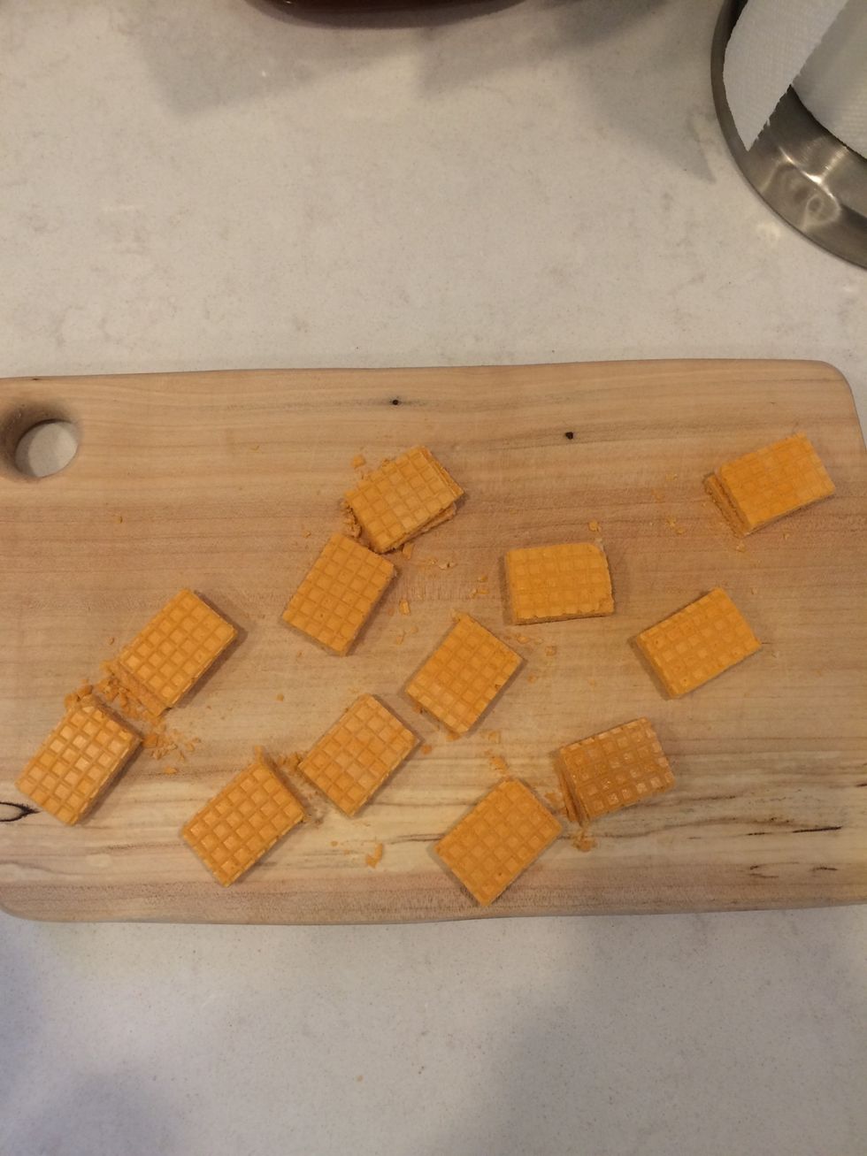Before you put them in the pan, take 18 vanilla crunch wafer crackers and cut them in half. This will mimic the delicious Butterfinger crunch!