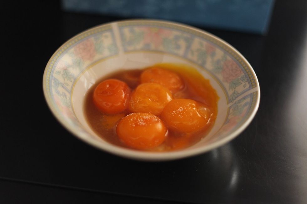 Before you start: In a small bowl, Add 5 egg yolks, 2 tablespoons of vanilla essence and a sprinkle of sugar. Leave it aside until the very end. Don't break the yolks yet. You can play later ;)