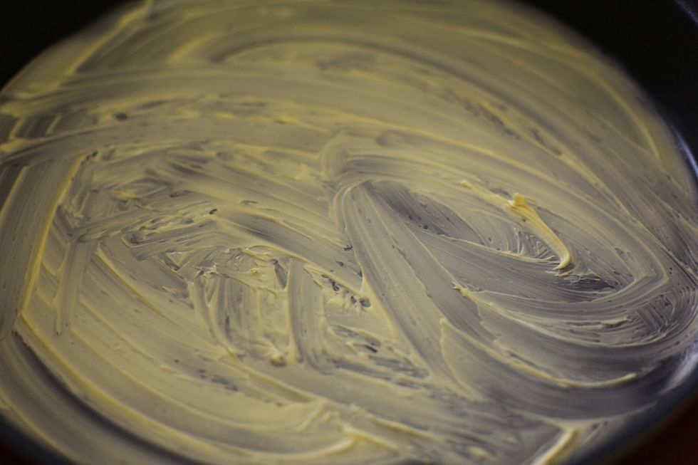 Before you start, Spread butter or margarine all over your baking tray. Leave it to the side for now.