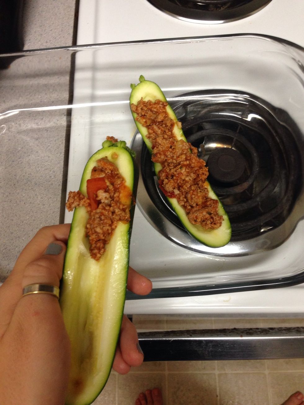 begin adding meat to zucchini