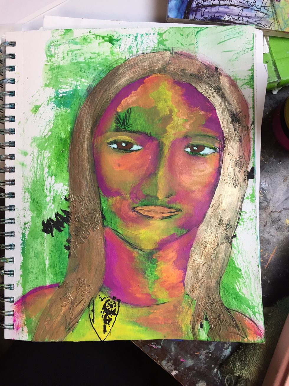 Begin adding some details with a stencil using modeling paste, I like black