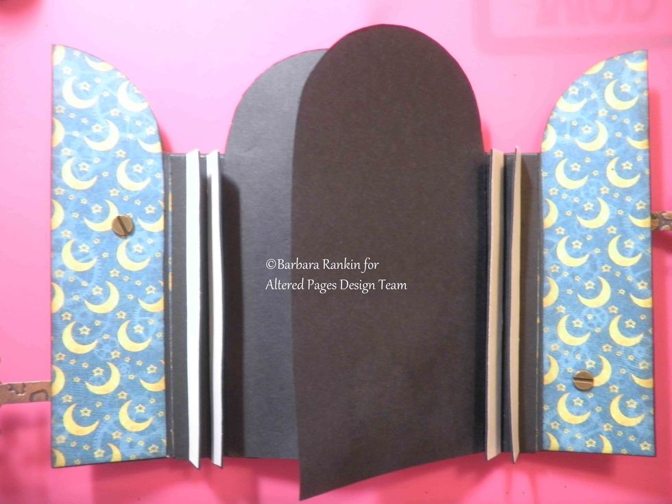 Begin adding your black CS pages to the tabs, as shown, to the strips of Scor-Tape.