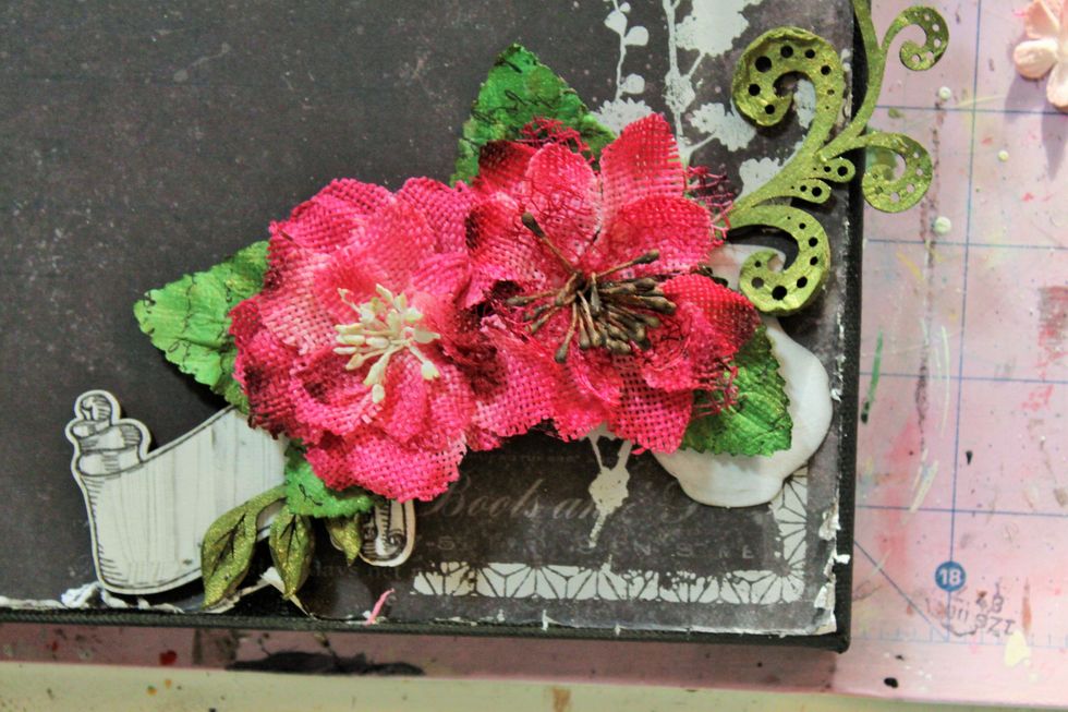 Begin building your flower cluster in the bottom right corner using ephemera from the kit as your base. I added these Petaloo flowers purchased from the Swirlydoos store.