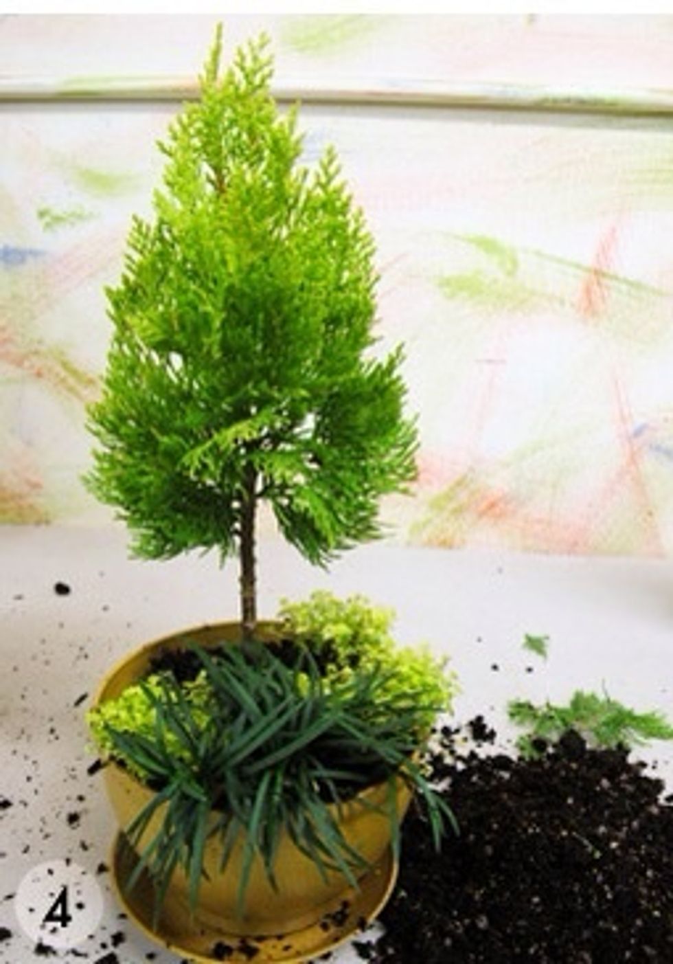 Begin "building" your garden, layering and rearranging until you are happy with the composition.