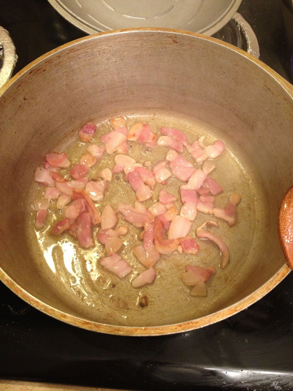 Begin by browning some pancetta in a pan with a drizzle of olive oil on medium high heat. You want the pancetta to get crispy but be careful not to burn. This gives your sauce a great savory taste.
