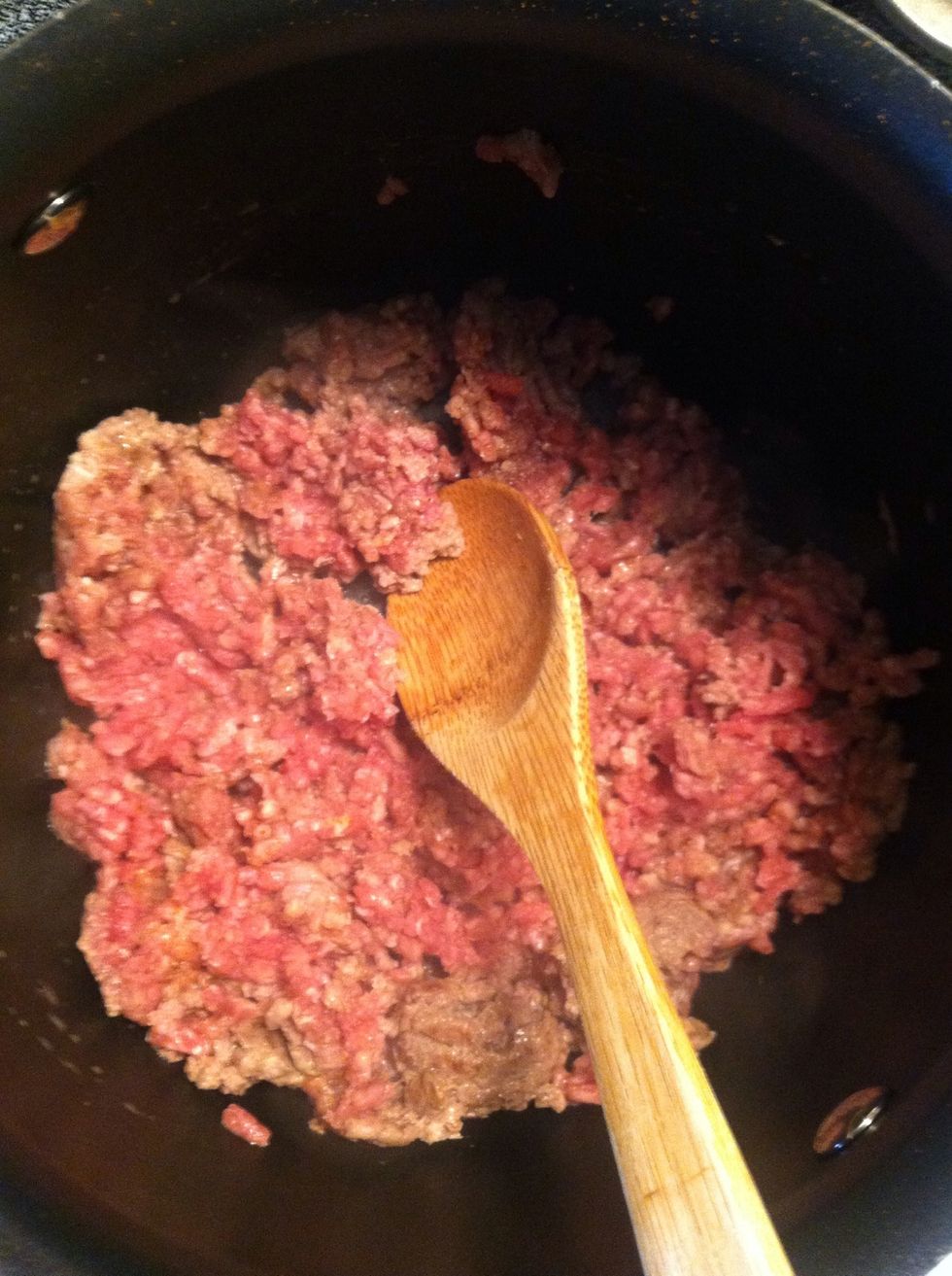 Begin by browning your ground beef or turkey.