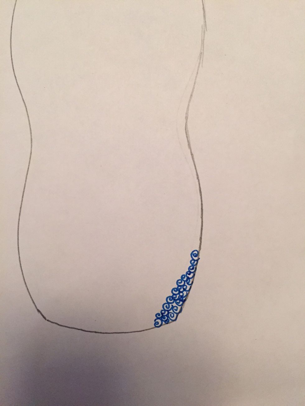 Begin by drawing your shape or symbol very small and close together along the pencil line on the right side of your bottle.