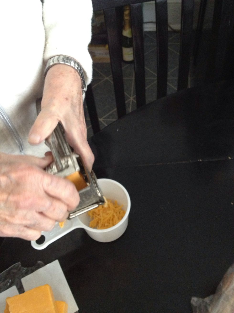 Begin by grating your cheese if it isn't already grated