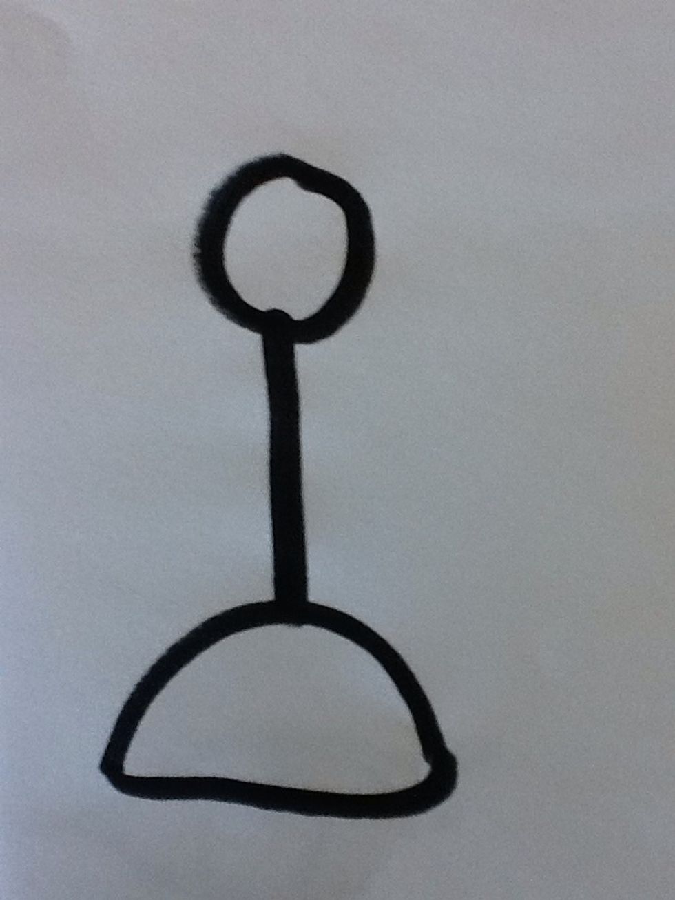 Begin by making a small circle, a stem or shaft, then the shape of the base for your scale.