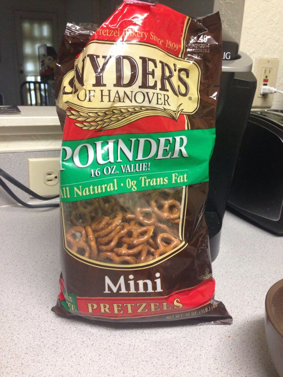 begin by placing about a handful of pretzels in food processor to chop up