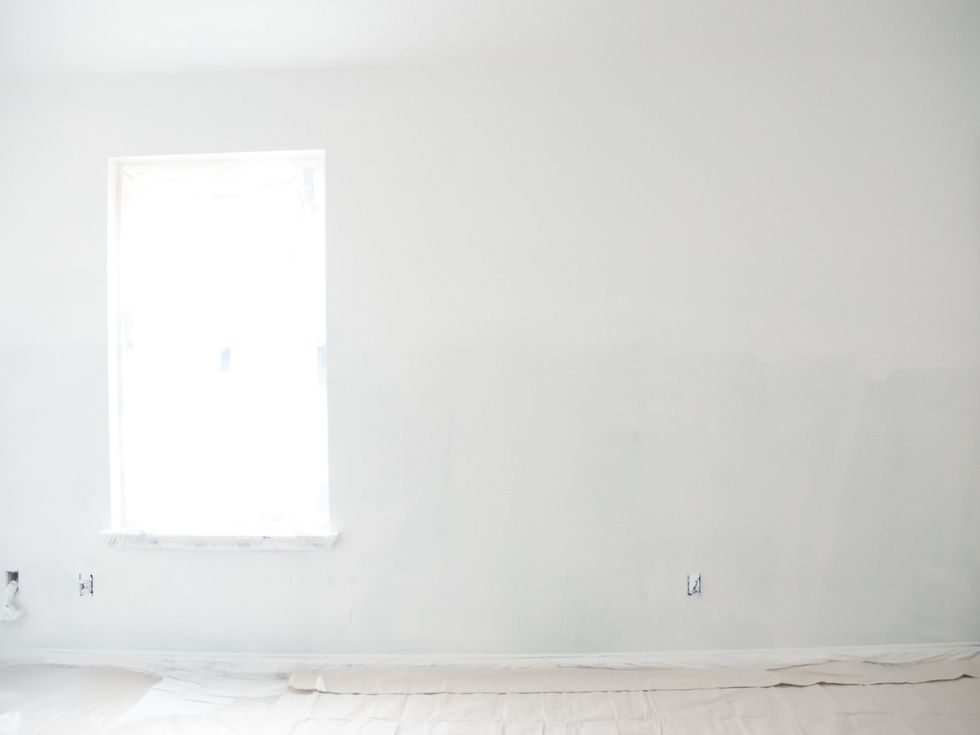 Begin by priming the wall you wish to ombre. I wanted the top of my wall (and ceiling) to be bright white, so I gave that part a couple of coats of White on White Glidden Premium Paint+Primer paint.