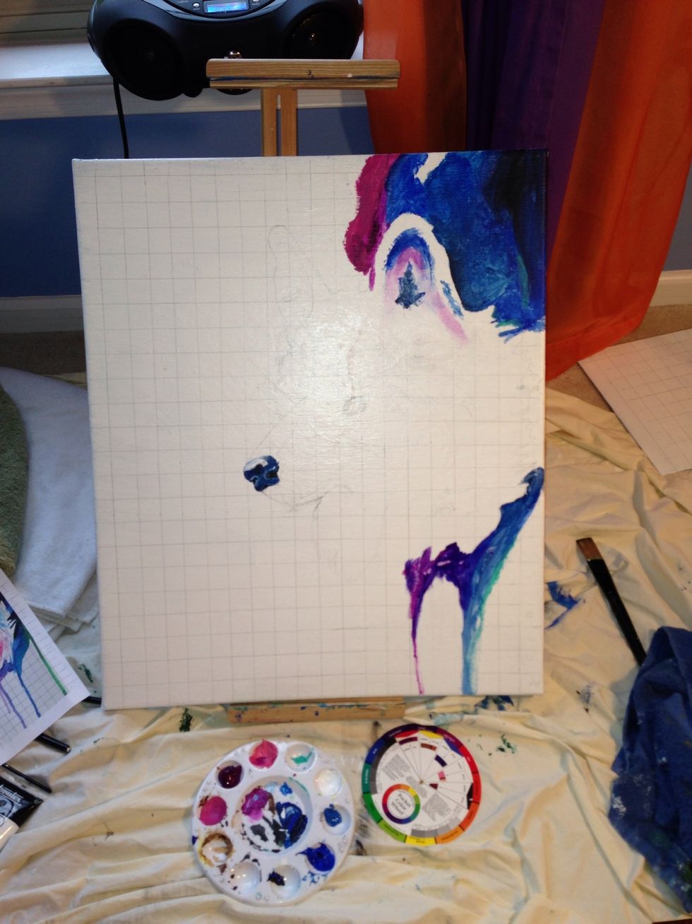 Begin by transferring your wolf picture onto the canvas. I did this by drawing a grid.