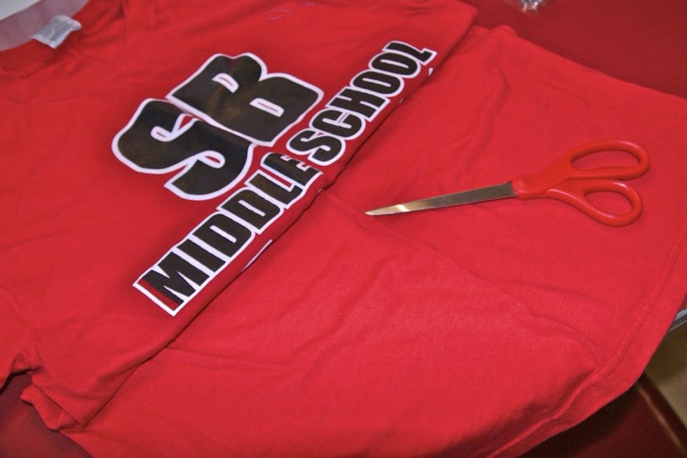 Begin by using either an old T-shirt (like I have) or buy fabrics of your choice :)