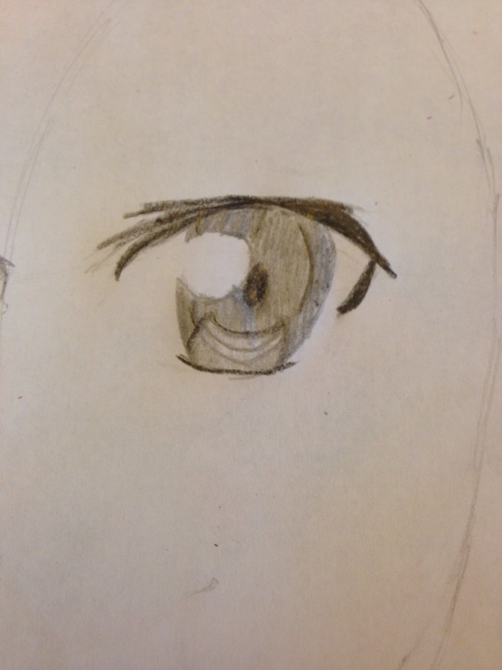 Begin coloring in his eye. \u2022If necessary, darken the pupil with your color pencil when coloring the inside of his eye. \u2022Color in the crescent like part lightly \u2022Darken the outline of his eye as well