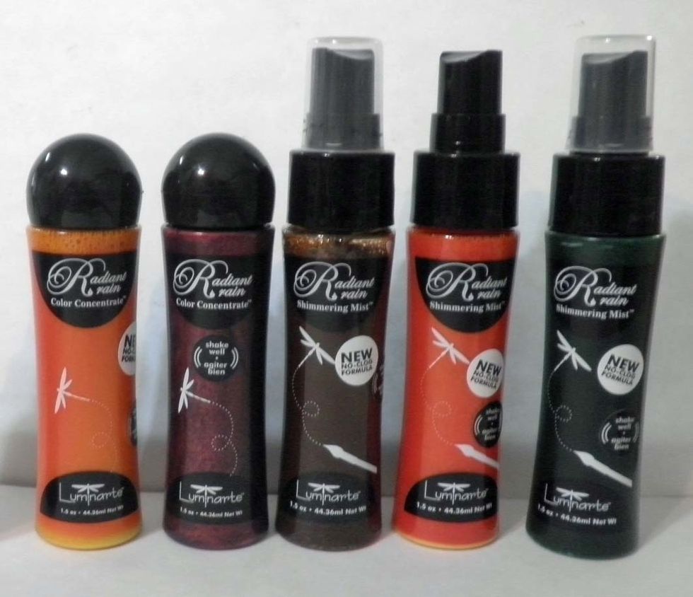 Begin coloring page with Radiant Rain dauber in Yellow Rose, Jasper Red, and water misted over all. Let dry, then add Radiant Rain shimmering mists in Ginger Peach and Autumn Leaf from colourarte.com